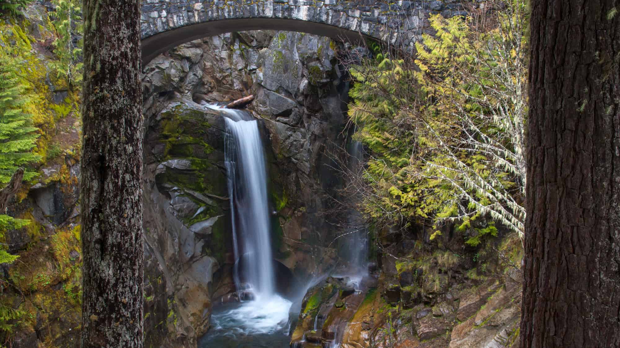 waterfall in mount rainier under the bridge
